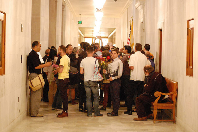 The "Airbnb Law" was signed by Mayor Ed Lee in October 2014 at San Francisco City Hall, legalizing short-term rentals in SF with many conditions. Image by Kevin Krejci (Flickr).