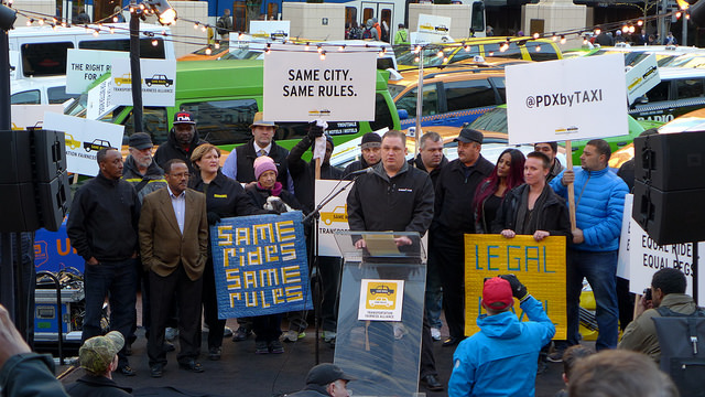 protested fair taxi laws by parking in Pioneer square. Organizers want city leaders to make ride-sharing companies play by the same rules as cabs and Town cars. Image: Aaron Parecki (Flickr).