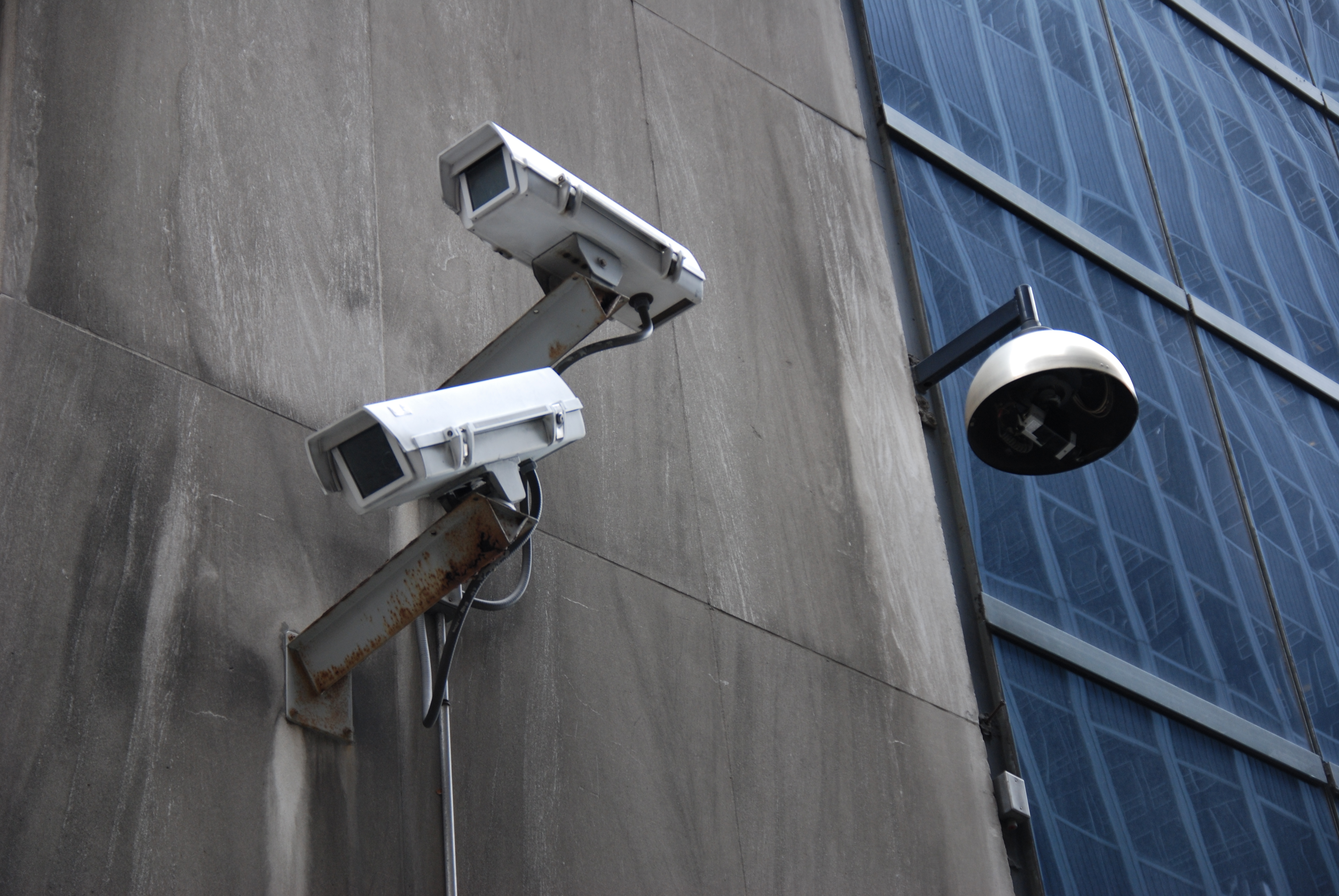 Surveillance in NYC's financial district. Photo by Jonathan McIntosh (flickr).